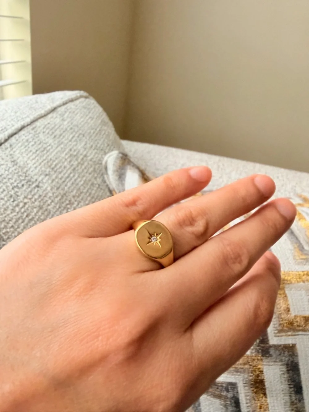 Gold Starburst Signet Ring with White Gemstone